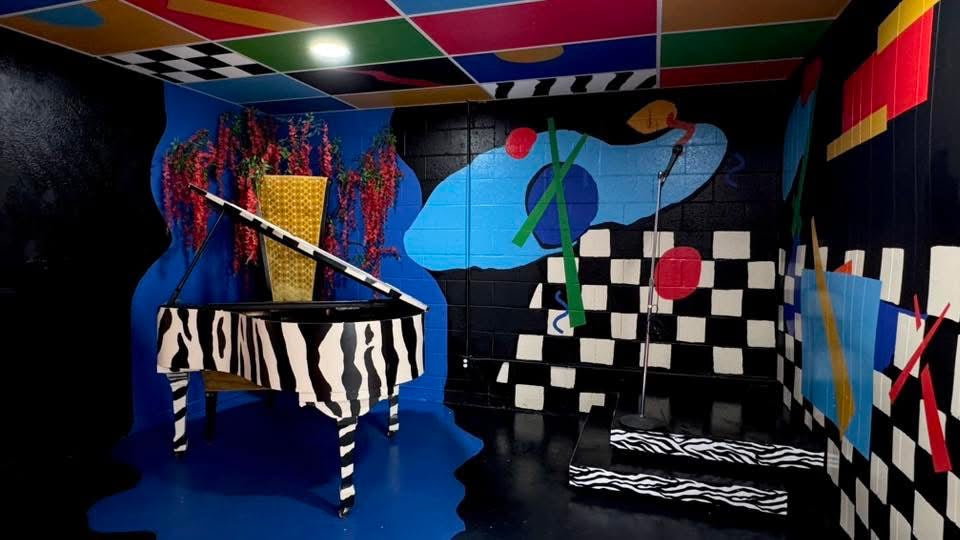 Zebra Piano Stage Rental | DFW Music Video & Photoshoot Studio