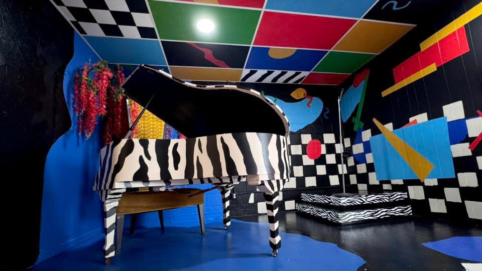 Zebra Piano Stage Rental | DFW Music Video & Photoshoot Studio