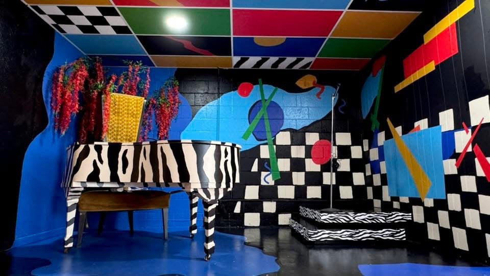 Zebra Piano Stage Rental | DFW Music Video & Photoshoot Studio