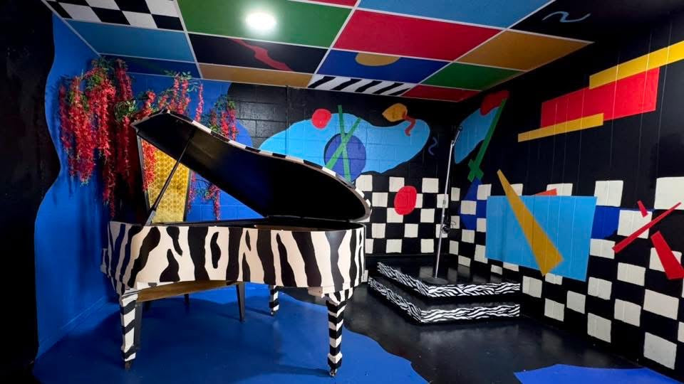 Zebra Piano Stage Rental | DFW Music Video & Photoshoot Studio