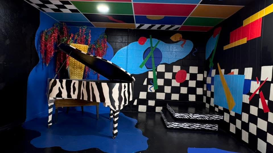 Zebra Piano Stage Rental | DFW Music Video & Photoshoot Studio