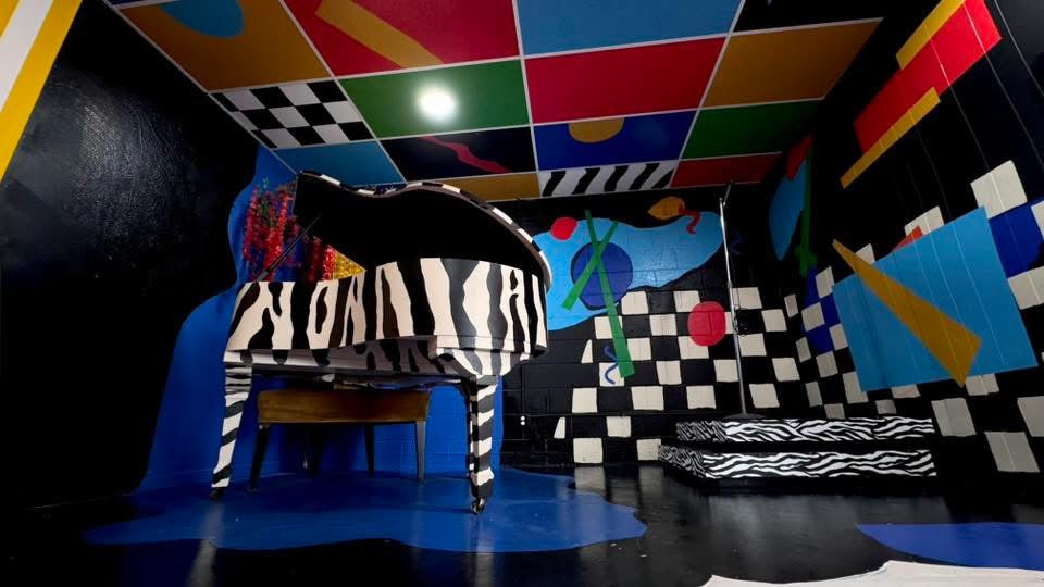 Zebra Piano Stage Rental | DFW Music Video & Photoshoot Studio