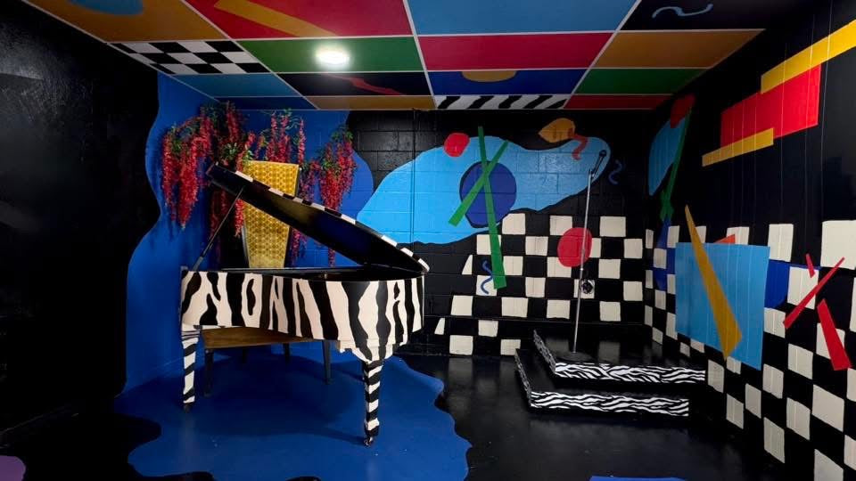 Zebra Piano Stage Rental | DFW Music Video & Photoshoot Studio