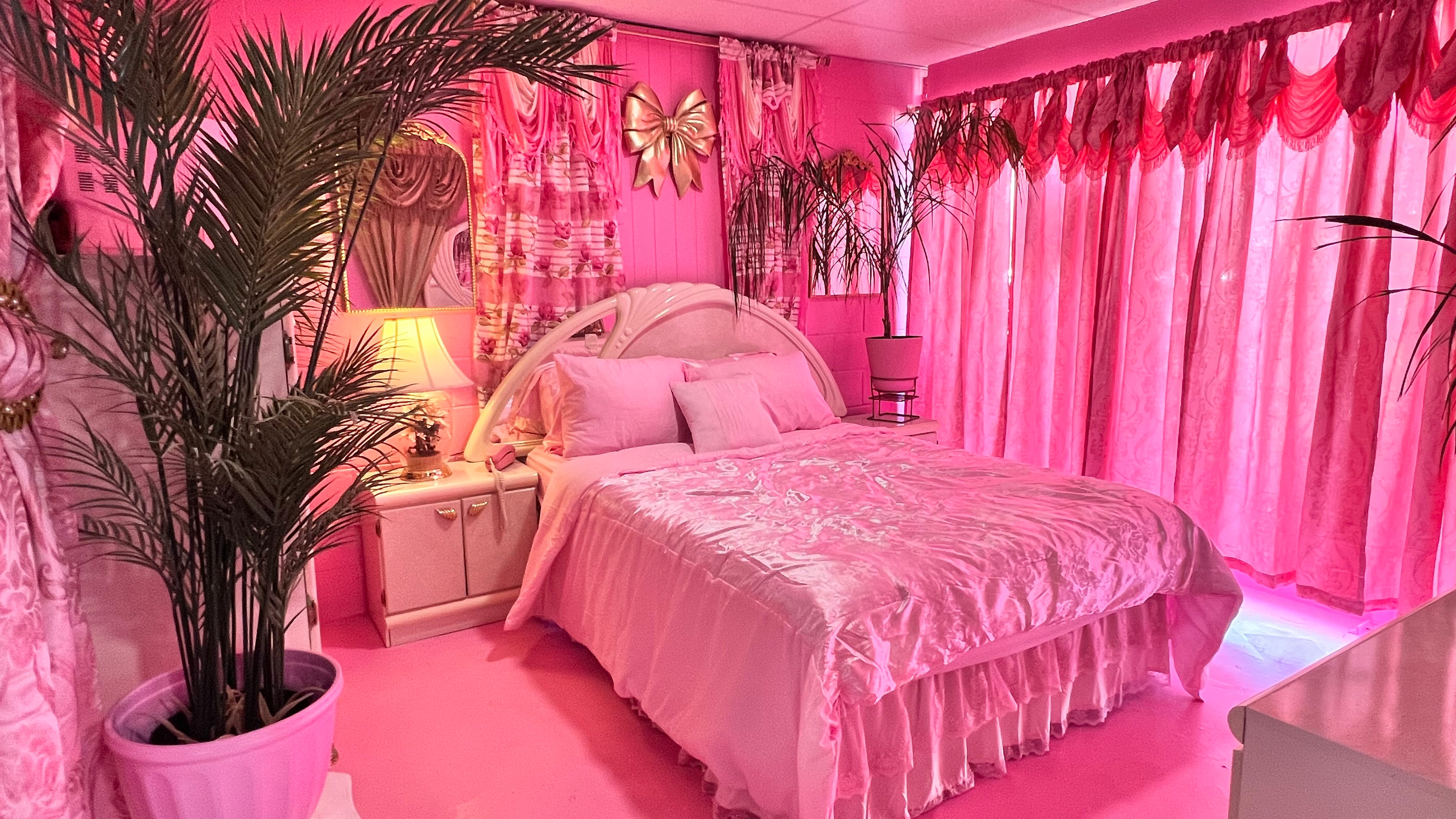 Create standout content in Lola, an immersive retro pink bedroom set with vintage furniture, mirrors, soft lighting, and optional fog and studio lights.